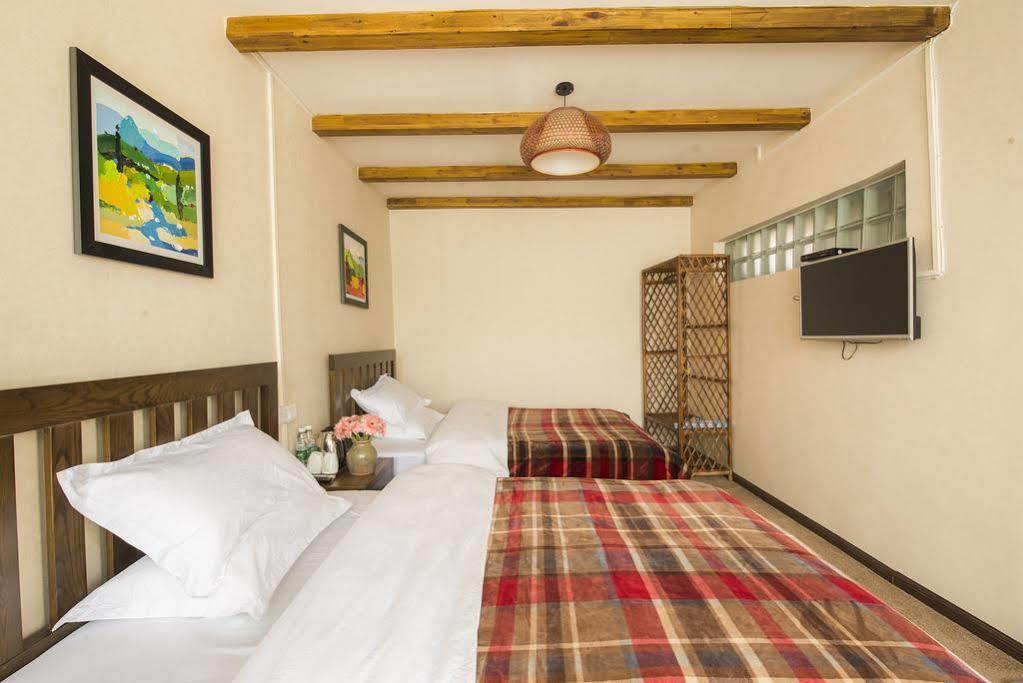 Li Jiang Wish Villa Hostel ลี่เจียง ภายนอก รูปภาพ